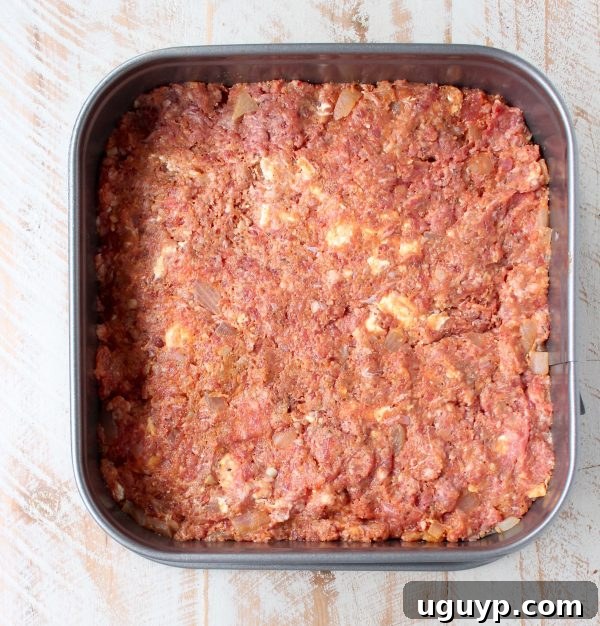 meatloaf mixture pressed into square pan