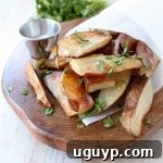 Roasted salt and vinegar potato wedges, a simple and flavorful side dish.
