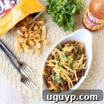 Spicy Buffalo Frito Chili Pie, an easy 20-minute recipe featuring buffalo sauce, green chilies, and savory spices.