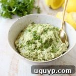 Healthy, vegan, and gluten-free Green Tahini Sauce recipe for buddha bowls, chicken, fish, or as a veggie dip.