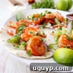 Buffalo Shrimp Tacos are an easy weeknight meal, made in just 15 minutes! They're also perfect for celebrating Taco Tuesday or Cinco De Mayo!