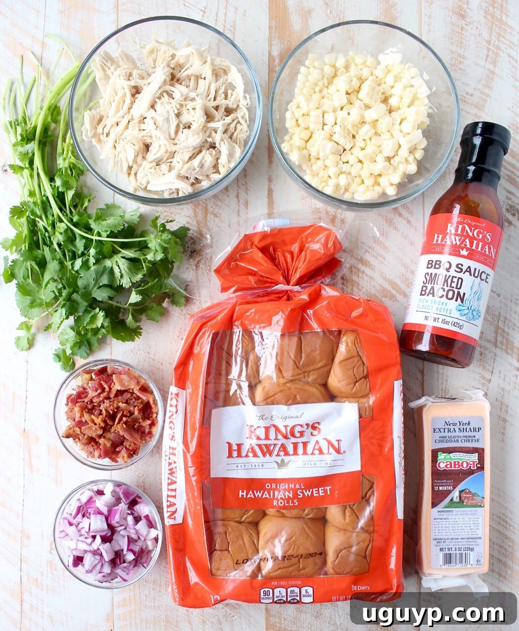 Close-up shot of BBQ Chicken Salad Sliders with fresh ingredients like corn and cilantro visible.