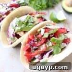 Blackened mahi mahi is pan seared & served in warm tortillas topped with crisp, fresh cilantro jalapeno coleslaw in this Mahi Mahi Fish Tacos recipe!