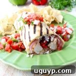 A delicious grilled burrito cut in half