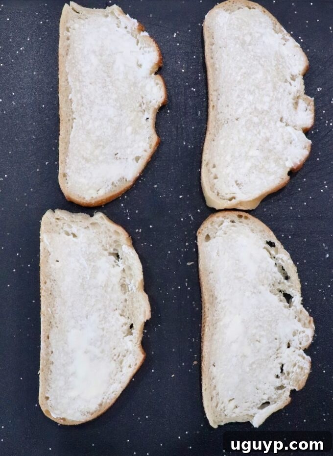 pieces of bread spread with butter