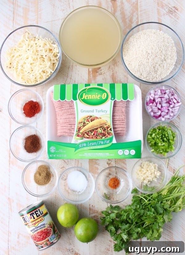 The finished Turkey Taco Rice Skillet, brimming with perfectly cooked rice and turkey, topped with a generous layer of melted cheese, ready to be garnished and enjoyed.
