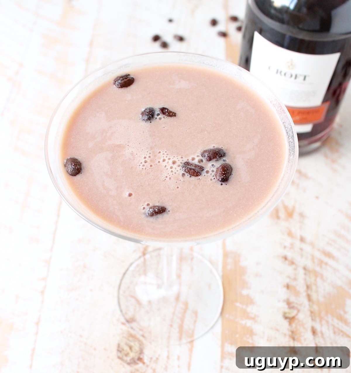 Close-up of a freshly made Port Coffee Martini, showcasing its rich color and elegant presentation with coffee bean garnish in a chilled glass.
