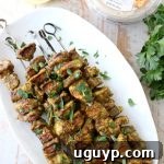 Fresh spinach, spices, lemon and olive oil are combined in an amazing marinade for these grilled Mediterranean Chicken Skewers!