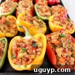 Ground chicken, spices, veggies and buffalo sauce are baked in bell peppers for a healthy recipe that's gluten free, dairy free and Whole30 compliant!