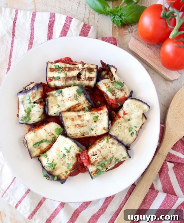 Italian seasoned ground turkey and mushrooms fill these delicious eggplant roll ups, baked in a flavorful tomato sauce. This recipe is gluten free, dairy free and Whole30 compliant!