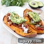 Deliciously easy Whole30 chipotle chili is added to these stuffed sweet potatoes for a scrumptious gluten free and dairy free meal, made in under an hour!