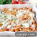 Three cheese baked ziti with ricotta, mozzarella and parmesan is an easy 6 ingredient, 29 minute meal that is sure to become a weeknight dinner family favorite!