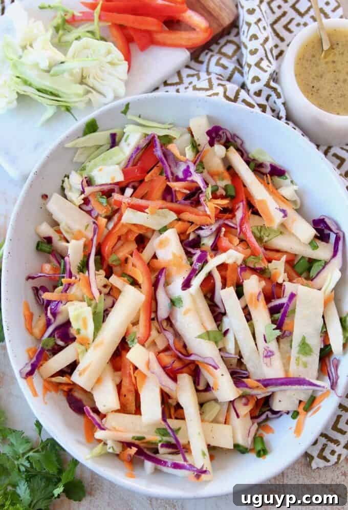 Vibrant Jicama Slaw in a serving bowl, ready to be enjoyed as a refreshing side dish