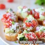 Greek Bruschetta with Tomatoes, Cucumber, Hummus and Feta