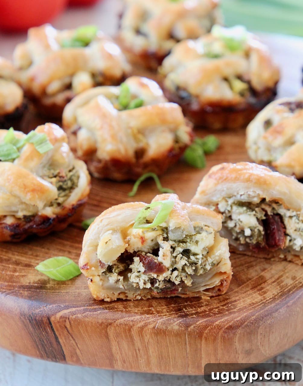 Mini Pies filled with Spinach, Feta Cheese and Sun Dried Tomatoes
