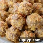 Bisquick Sausage Balls piled on a plate.