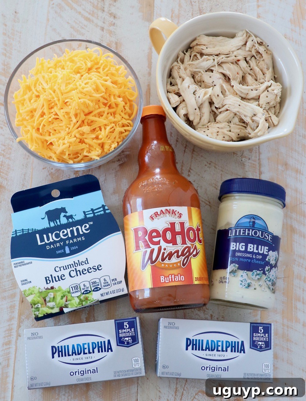 assortment of fresh ingredients for buffalo chicken dip, neatly arranged