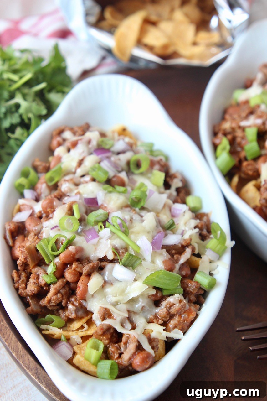 frito chili pie in white serving dish