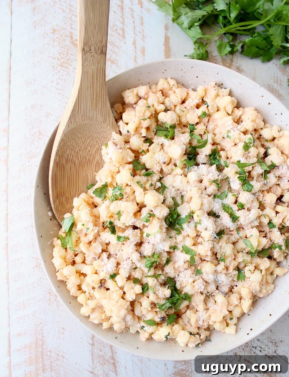 Deconstructed Mexican Street Corn combines grilled corn off the cob, cilantro, sour cream, lime juice & parmesan cheese for an amazingly flavorful side dish recipe!