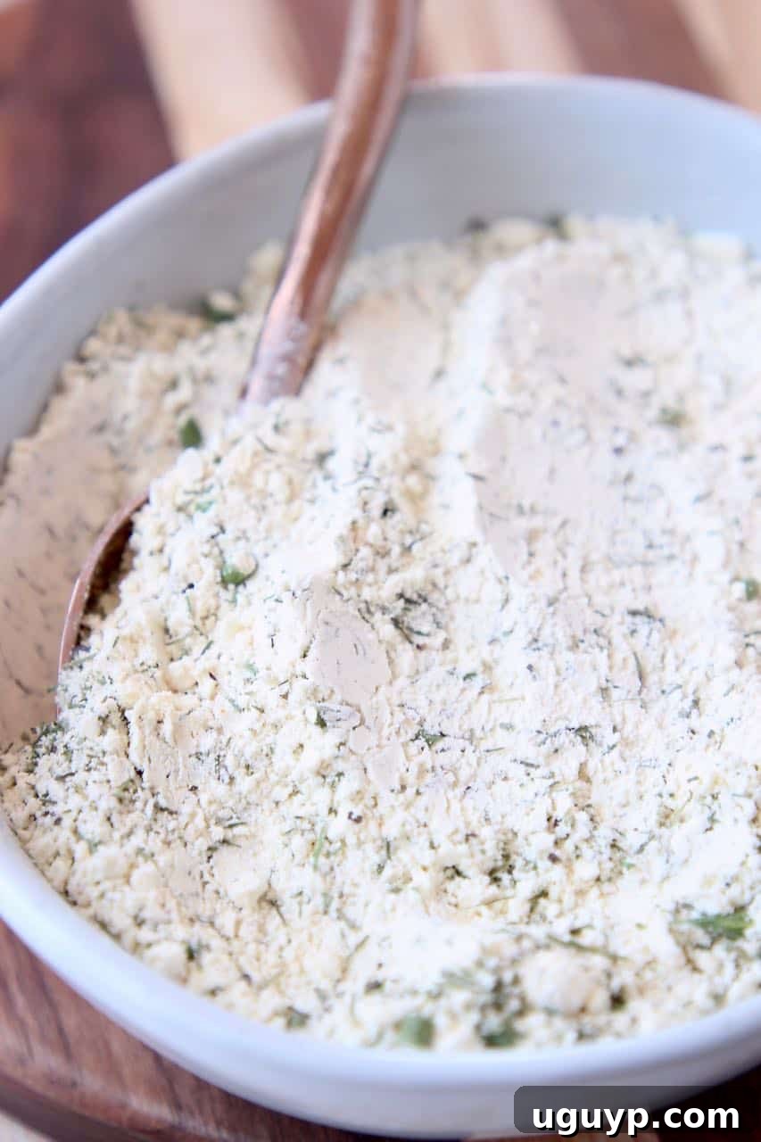 Ranch seasoning mix in bowl with spoon