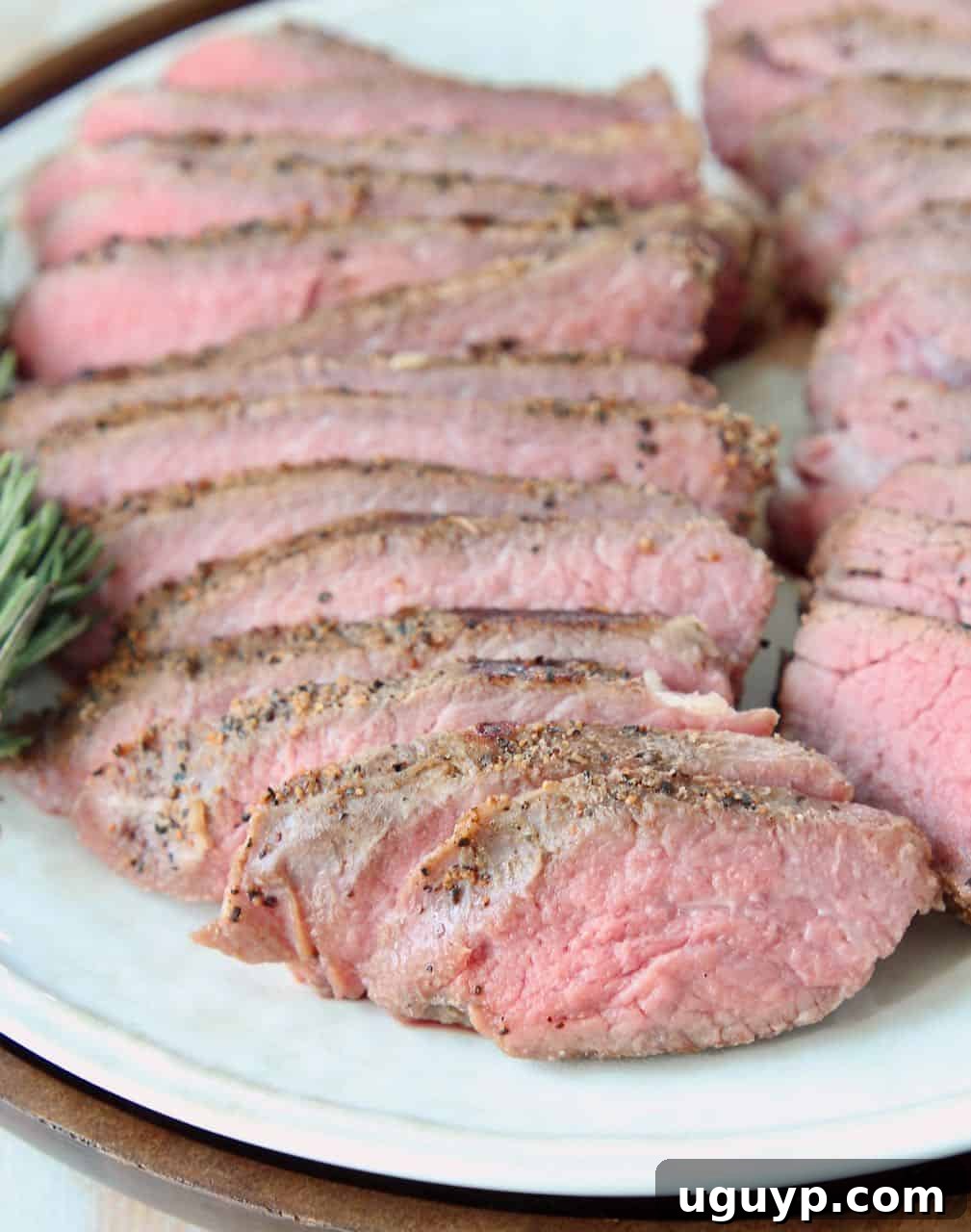 Sliced sous vide tri tip steak on plate