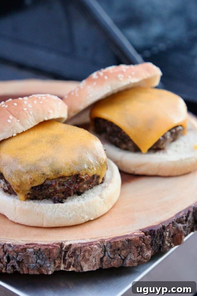 delicious grilled cheeseburgers on a wooden cutting board, ready to serve