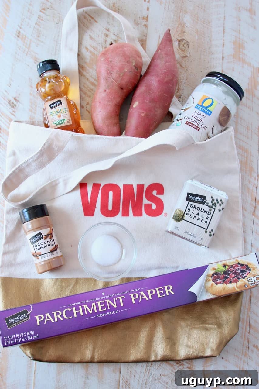 Various ingredients laid out for honey roasted sweet potatoes: raw sweet potatoes, honey, coconut oil, cinnamon, salt, pepper