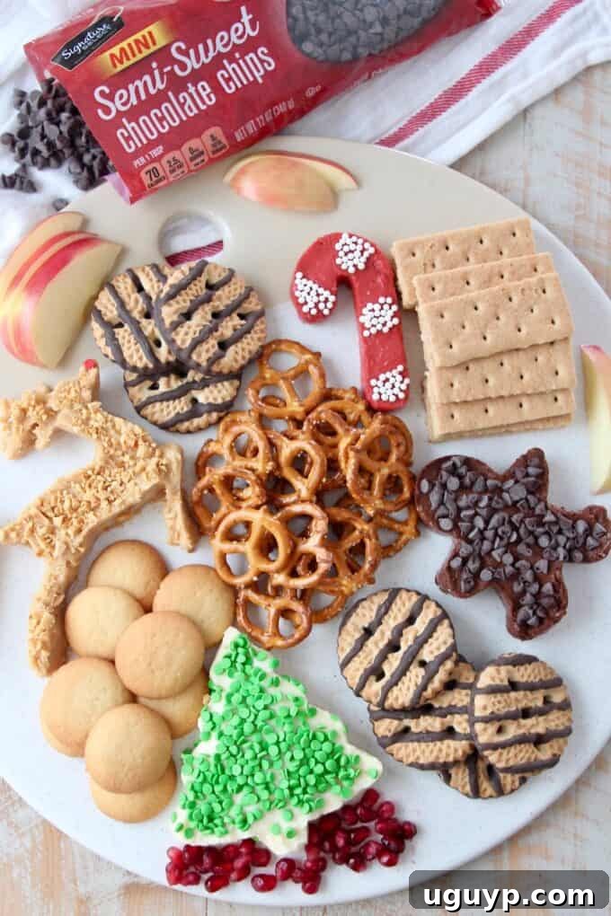 overhead image of holiday dessert board with chocolate chips on the side