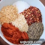 overhead image of spices in white bowl