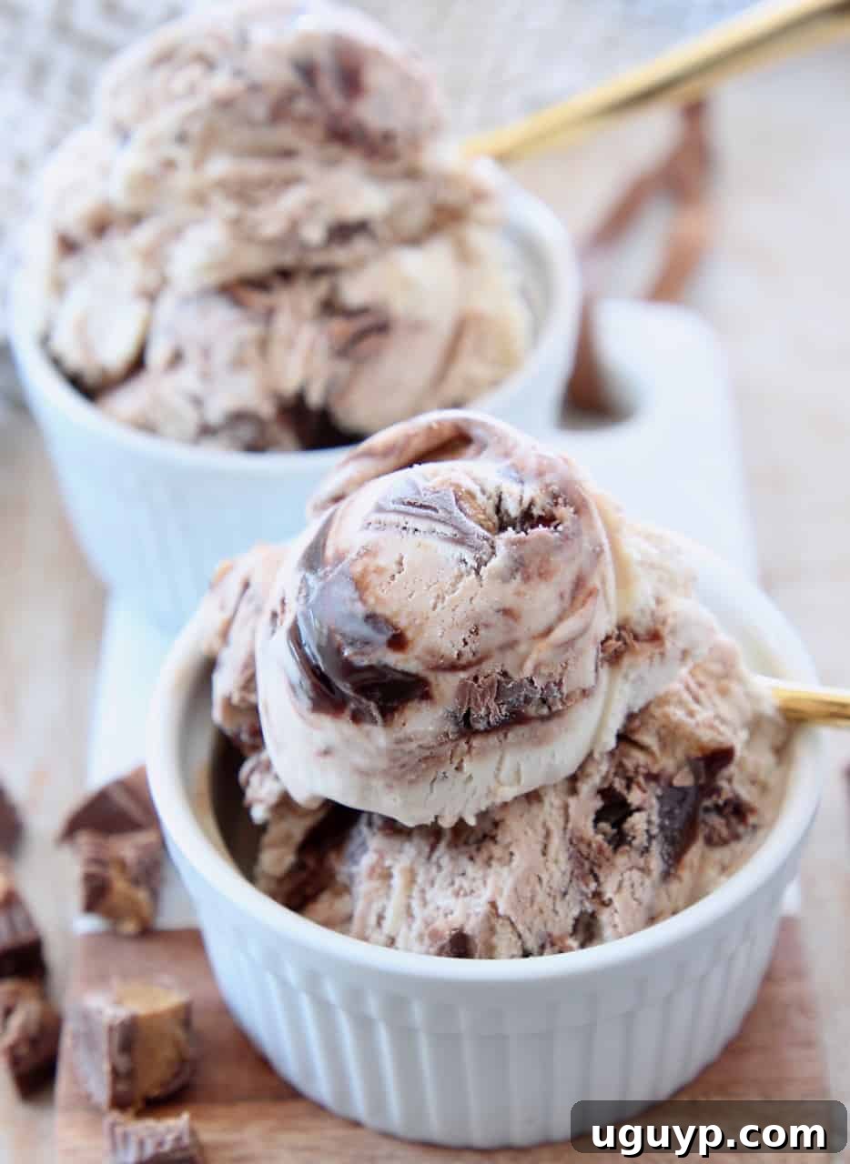 scoops of ice cream in white bowl with gold spoon