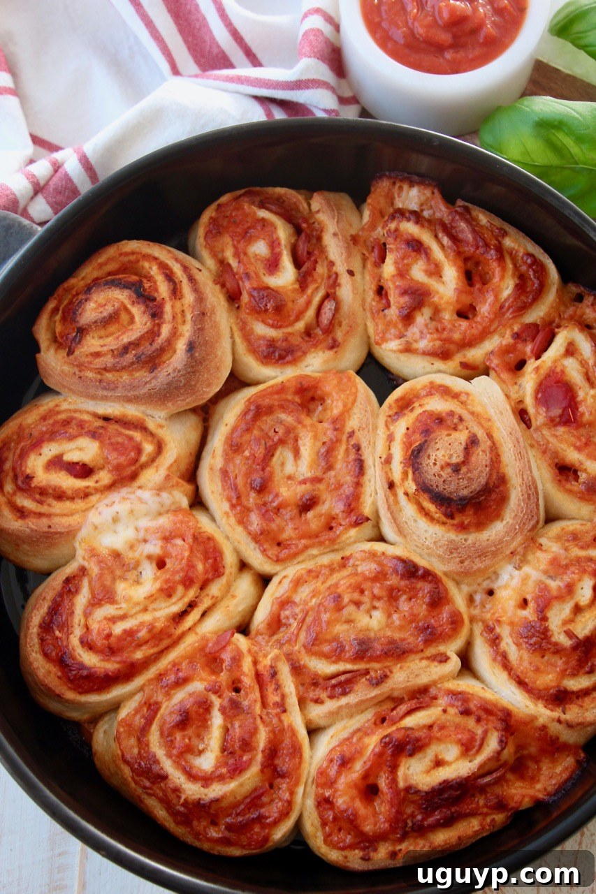cooked pizza rolls in pan