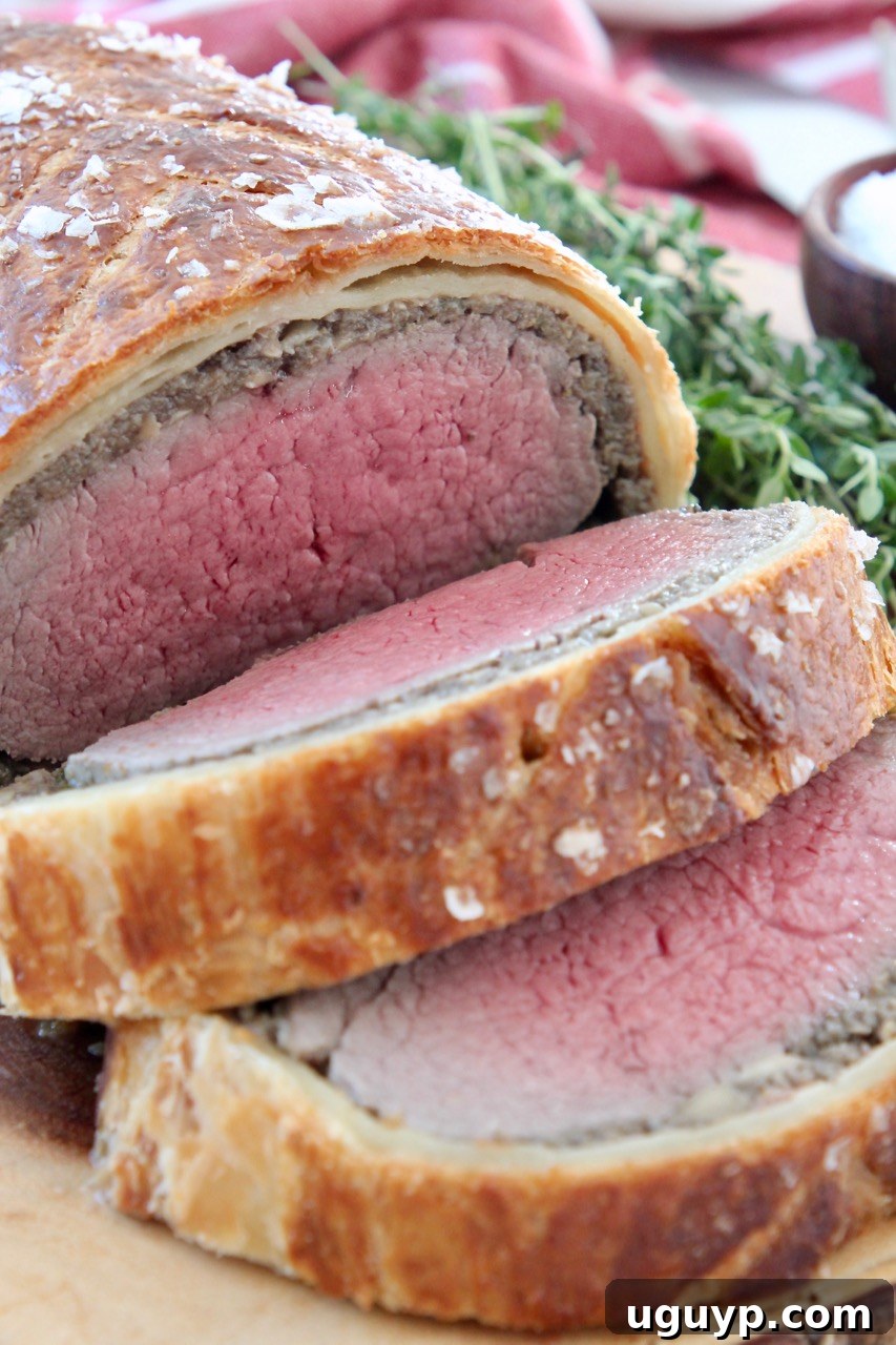 sliced cooked beef wellington