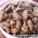 candied pecans in white bowl