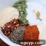 Homemade Chicken Seasoning in a bowl with a spoon