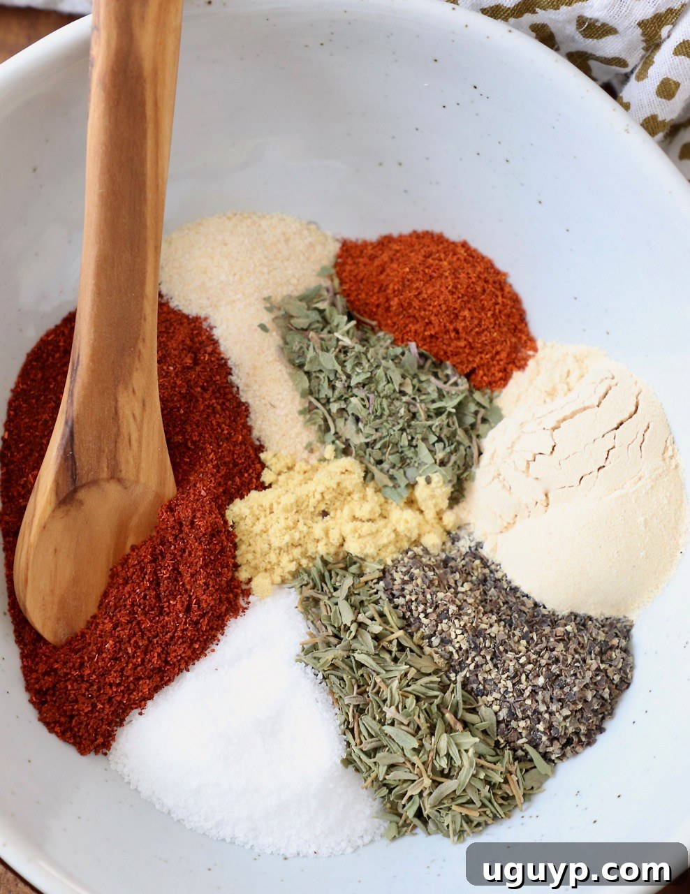 A bowl filled with a fresh, easy-to-mix homemade pork chop seasoning blend, ready for your next culinary creation.