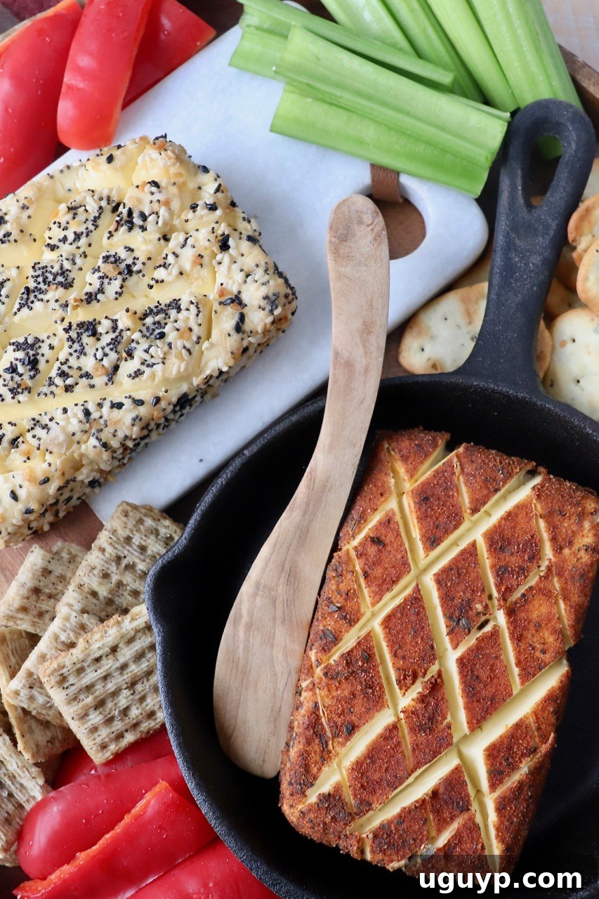 smoked cream cheese on platter with crackers and vegetables