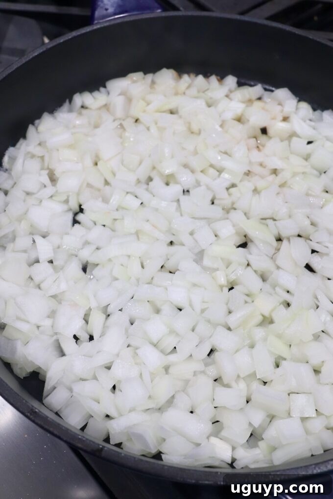diced onions in skillet