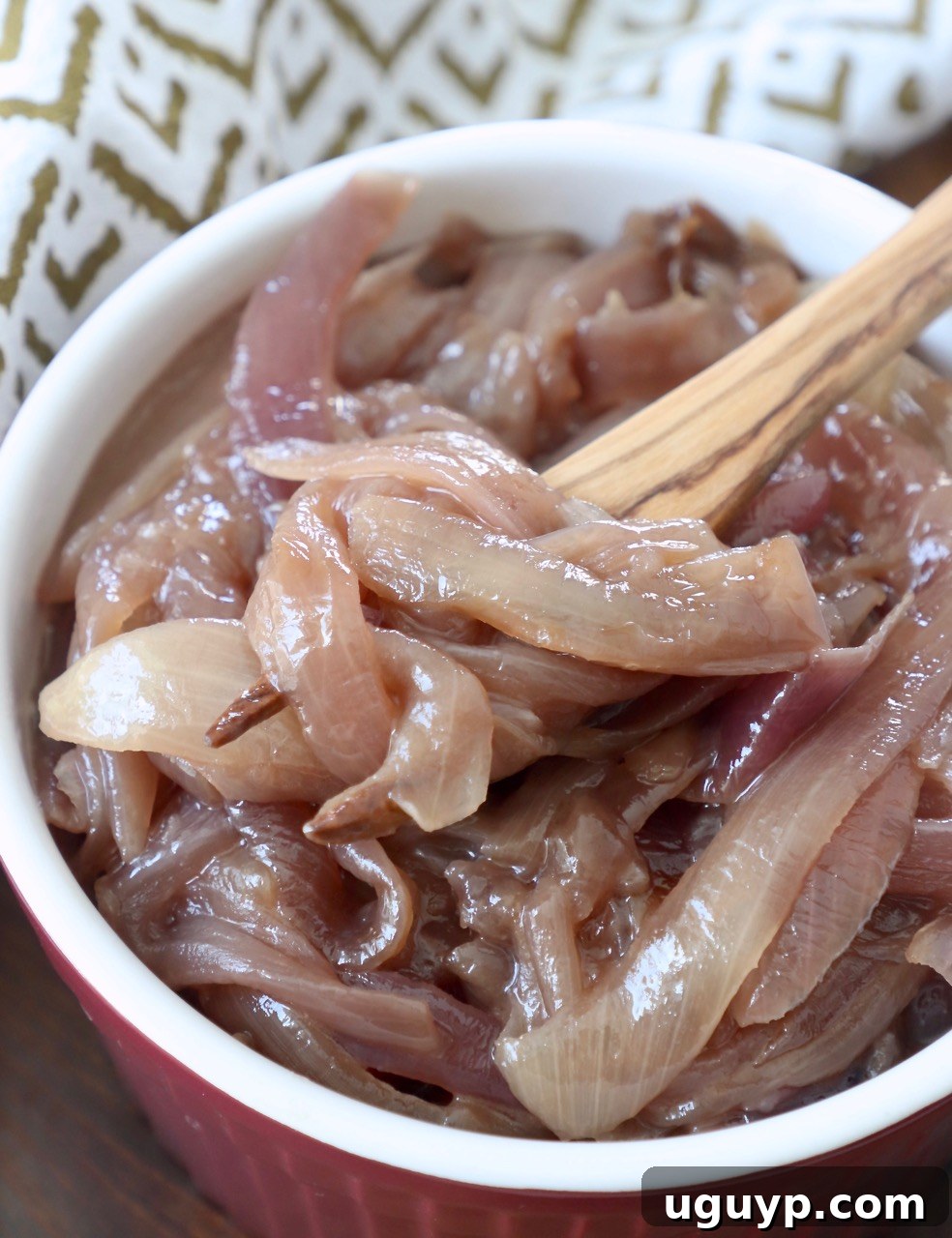 caramelized onions in bowl with fork