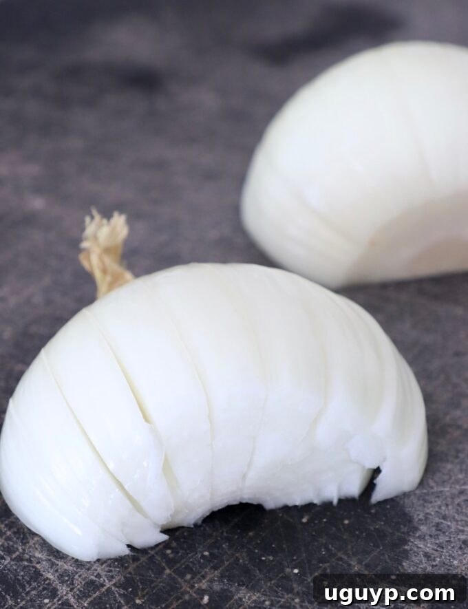 onion sliced on cutting board