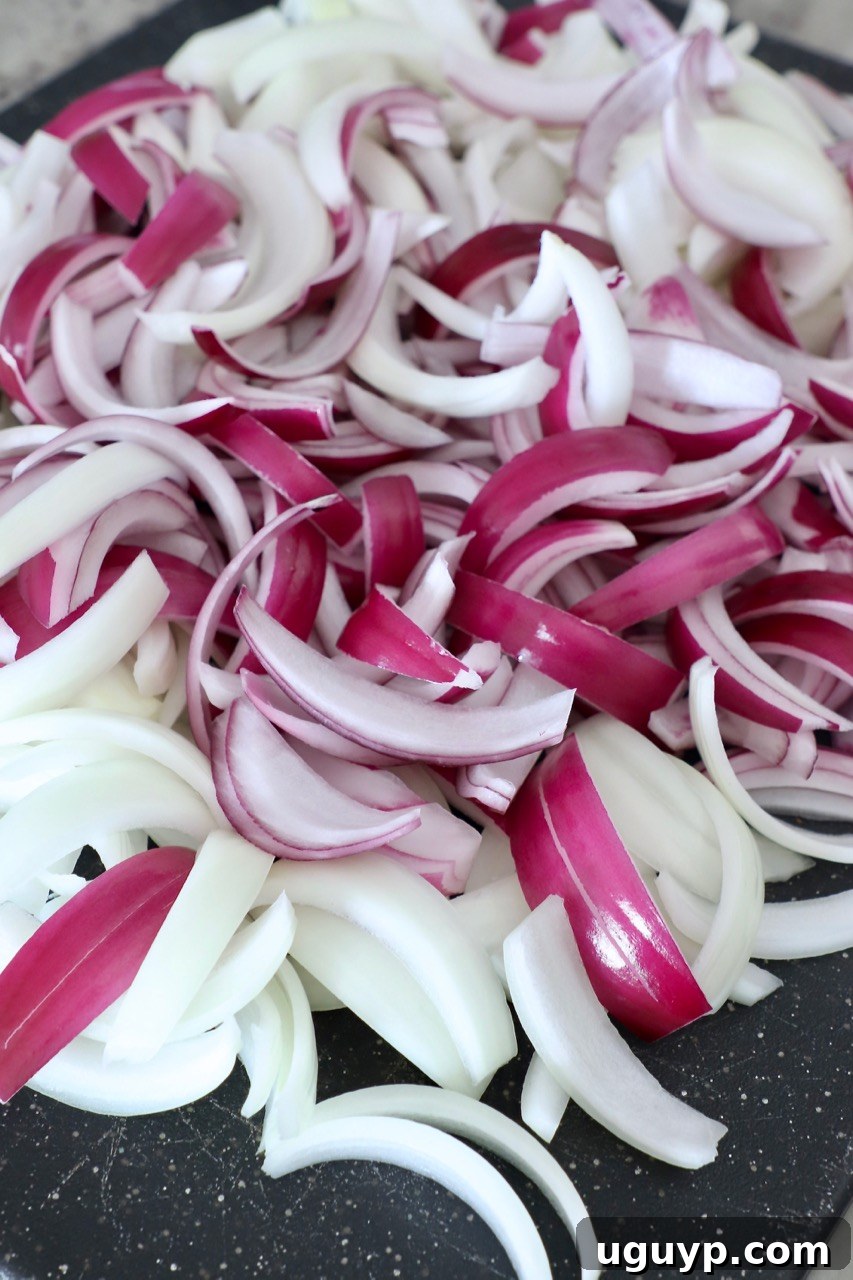 sliced onion on cutting board