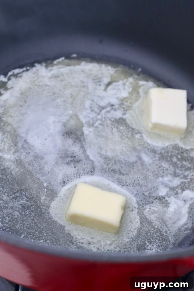 butter melting in cast iron pot