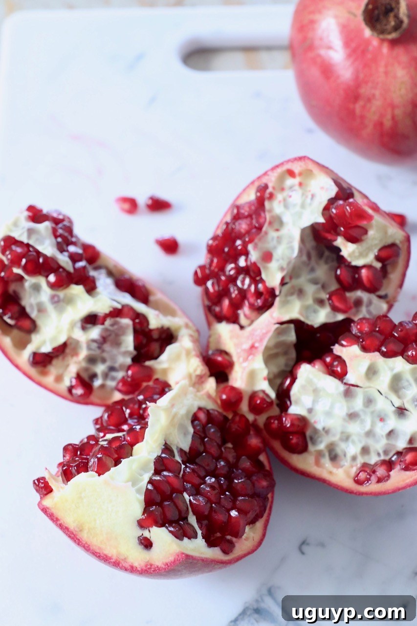 Pomegranate cut into sections, ready for aril removal.