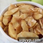 A bowl of freshly made apple pie filling.