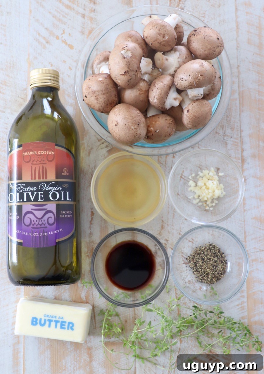Ingredients for sauteed mushrooms laid out on a wooden board