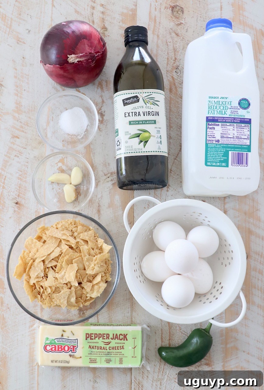 ingredients for migas on white wood cutting board