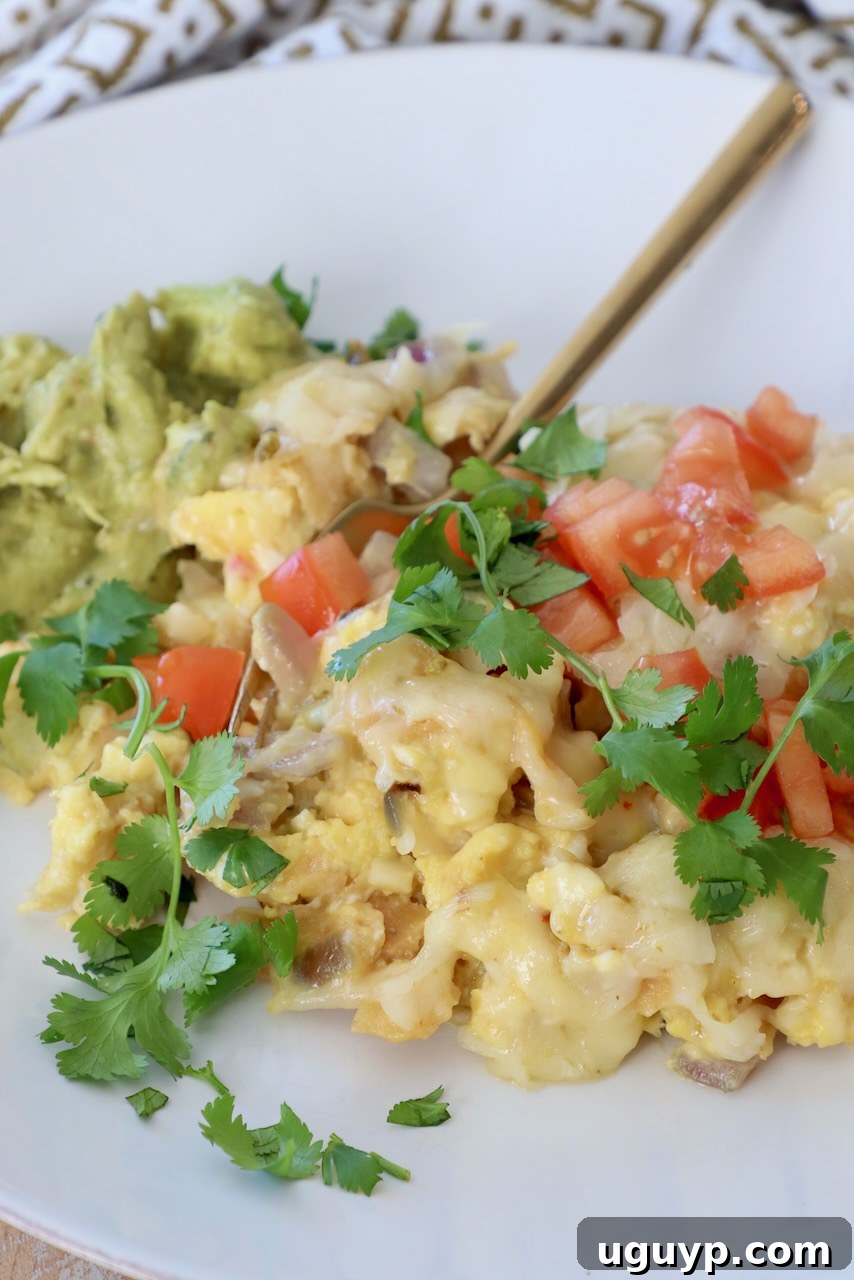 migas on plate with gold fork