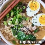 An inviting bowl of Miso Ramen noodle soup with chopsticks resting on the side, ready to be enjoyed.