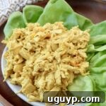 coronation chicken on plate with leaves of lettuce