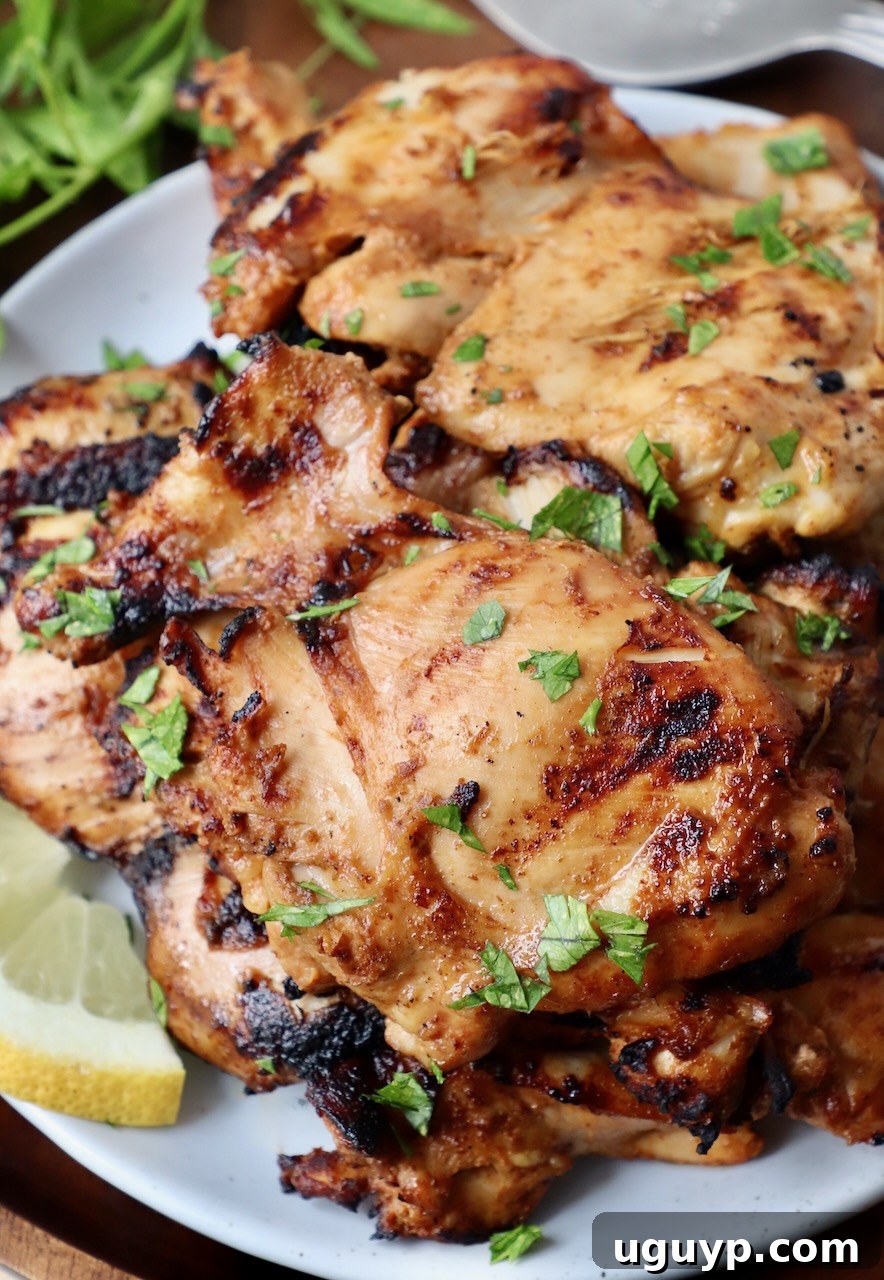 grilled chicken thighs on plate