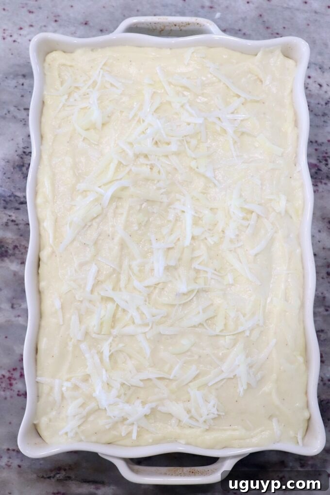 assembled, uncooked pastitsio in casserole dish
